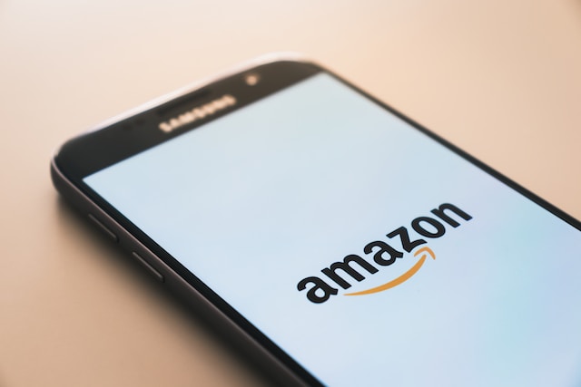 The Amazon logo on a smartphone
